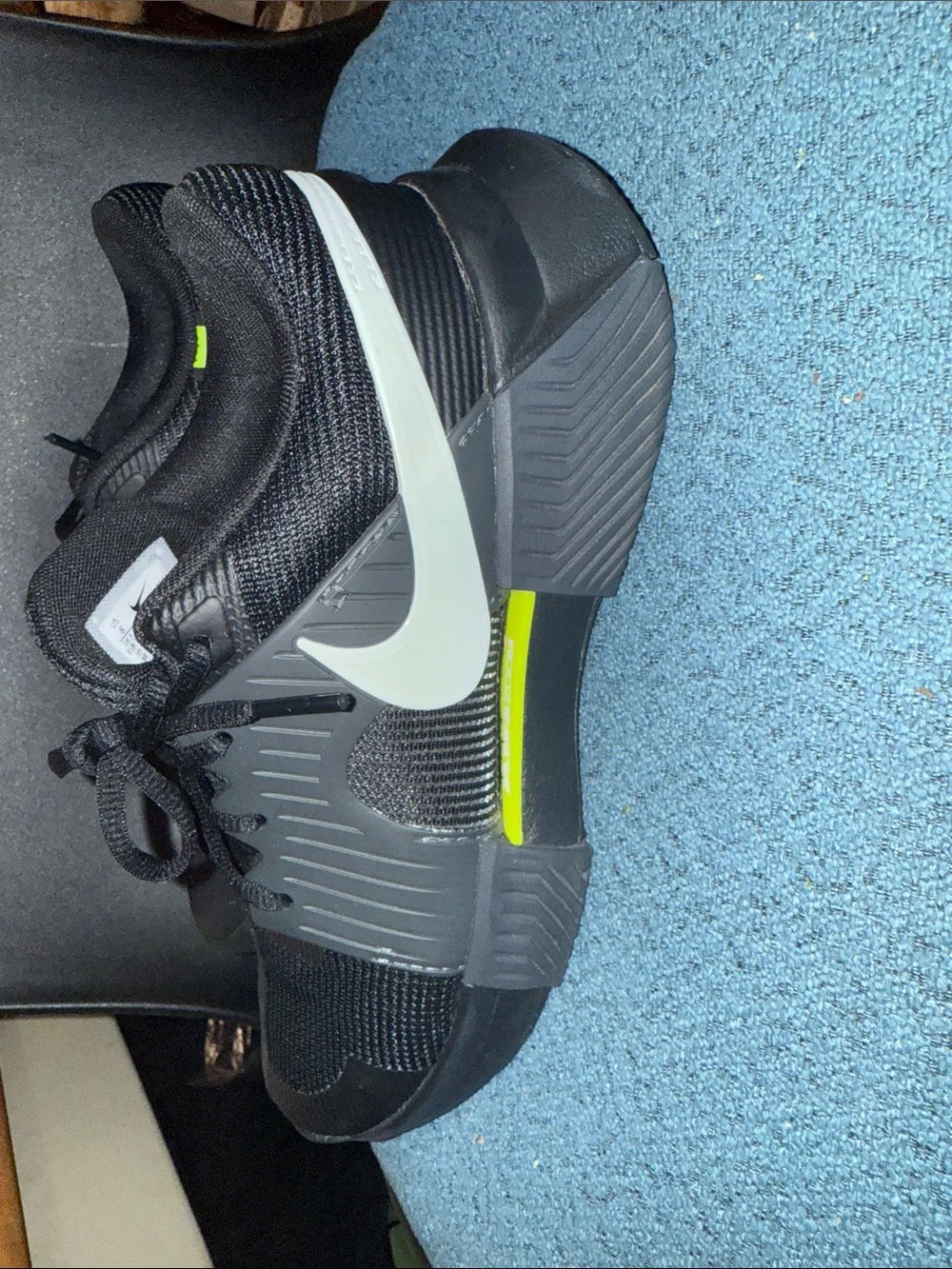 Nike Kids Black Sneakers with White Swoosh and Neon Yellow Accent